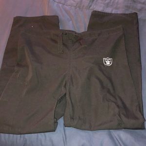 Black raiders scrub pants